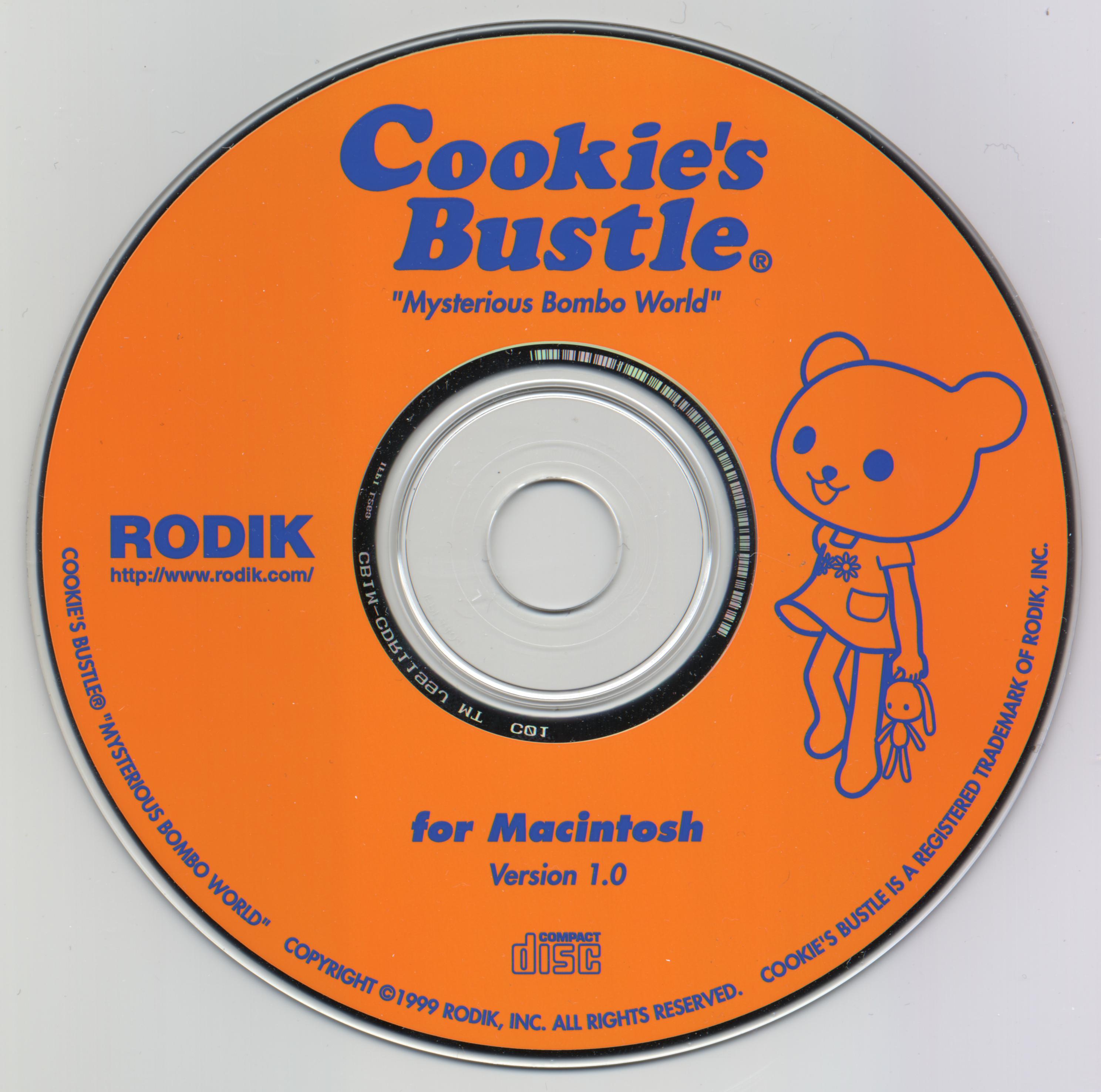 An image of the Cookie's Bustle disc.  It's an orange disc with blue text & lines.  At the top it reads 'Cookie's Bustle,' with the subtitle 'Mysterious Bombo World.'  To the right is Cookie, a lineart version of the same render from the 'Starring Cookie Blair!' image.  To the left is the Rodik logo and a link to their website.  Below the hole in the middle of the disc, it reads 'For Macintosh, version 1.0'.  Below that is the Compact Disc logo.  Copyright information is written along the bottom edge of the disc.
